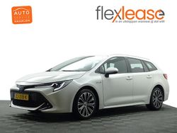Wit metallic Gebruikt 2019 Toyota Corolla Executive Stationwagen | € 17.900 (Eerlijke prijs)