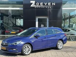 Blauw, metallic lak Gebruikt 2017 Opel Astra Edition Stationwagen | € 7.995 (Goede deal)