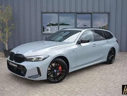 Grijs Gebruikt 2023 BMW 320e M Sport Stationwagen | € 44.950 (Duur)