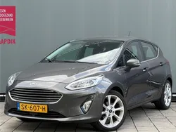 Grijs, metallic lak Gebruikt 2018 Ford Fiesta Titanium Hatchback | € 8.444 (Eerlijke prijs)