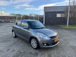 Grijs (metallic) Gebruikt 2011 Suzuki Swift Exclusive Hatchback | € 4.950 (Goede deal)