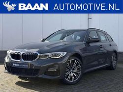 Grijs Gebruikt 2021 BMW 330e M Sport Stationwagen | € 31.595 (Goede deal)