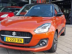 Oranje Gebruikt 2021 Suzuki Swift Style | € 17.999 (Eerlijke prijs)