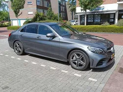 Grijs Gebruikt 2018 Mercedes C180 AMG Sedan | € 26.990 (Eerlijke prijs)