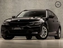 Zwart Gebruikt 2022 BMW 320e Sport Line Stationwagen | € 27.945 (Eerlijke prijs)