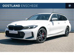 Wit Gebruikt 2024 BMW 320e Comfort Edition Stationwagen | € 47.450 (Iets duurder)