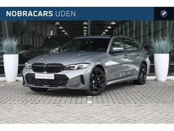 Skyscraper grey (grijs metallic) Gebruikt 2025 BMW 330e Executive Stationwagen | € 57.850 (Eerlijke prijs)