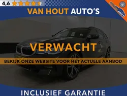 Grijs Gebruikt 2021 BMW 320e Sport Line Stationwagen | € 22.950 (Eerlijke prijs)
