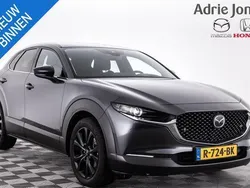 Machine gray Gebruikt 2022 Mazda CX-30 Homura-Line SUV | € 26.939 (Eerlijke prijs)
