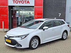 Wit Gebruikt 2024 Toyota Corolla Hybrid Active Stationwagen | € 27.900