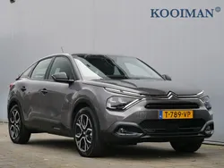 Grijs Gebruikt 2023 Citroën e-C4 Feel SUV | € 19.595 (Eerlijke prijs)