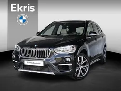 Saphirschwarz metallic (zwart metallic) Gebruikt 2018 BMW X1 Comfort Edition SUV | € 24.850 (Eerlijke prijs)