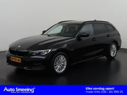 Zwart Gebruikt 2022 BMW 330e Sport Line Stationwagen | € 30.895 (Goede deal)
