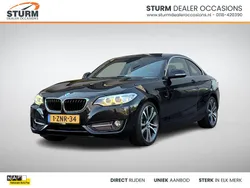 Zwart Gebruikt 2015 BMW 220 Executive Coupé | € 17.579 (Goede deal)