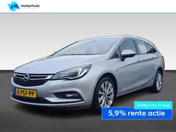 Grijs Gebruikt 2018 Opel Astra Business Stationwagen | € 14.890 (Iets duurder)