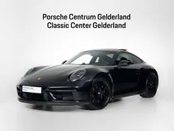Diepzwart metallic Gebruikt 2022 Porsche 911 Carrera 4 GTS Coupé | € 184.900 (Goede deal)