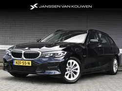Zwart Gebruikt 2022 BMW 320e Stationwagen | € 29.945 (Goede deal)