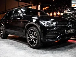 Zwart, metallic lak Gebruikt 2021 Mercedes GLC300e AMG line Coupé | € 52.800 (Eerlijke prijs)