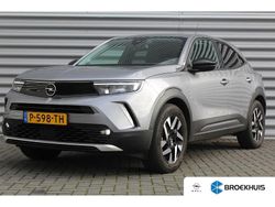 Grijs Gebruikt 2022 Opel Mokka-e Elegance SUV | € 16.900 (Goede deal)