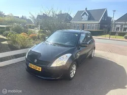 Zwart, metallic lak Gebruikt 2012 Suzuki Swift Comfort Hatchback | € 7.950 (Eerlijke prijs)