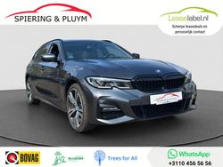 Grijs Gebruikt 2022 BMW 320e M Sport Stationwagen | € 27.875 (Goede deal)