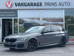 Grijs Gebruikt 2022 BMW 530e M Sport Stationwagen | € 39.895 (Eerlijke prijs)