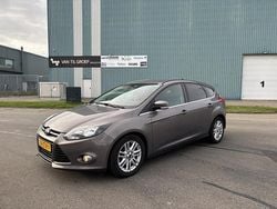 Bruin Gebruikt 2013 Ford Focus Titanium Hatchback | € 4.750 (Eerlijke prijs)