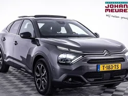 Grijs, metallic lak Gebruikt 2023 Citroën e-C4 Shine Sedan | € 21.490 (Eerlijke prijs)