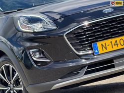 Zwart Gebruikt 2021 Ford Puma Gen-E Titanium SUV | € 18.425