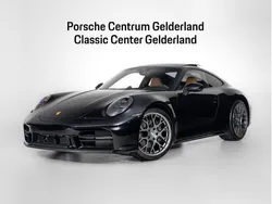 Diepzwart metallic Nieuw 2024 Porsche 911 Carrera Coupé | € 249.575