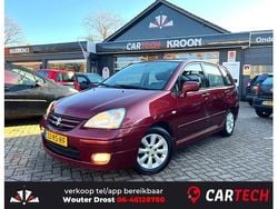 Rood (metallic) Gebruikt 2005 Suzuki Liana Exclusive Hatchback | € 3.900