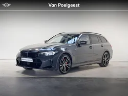 Bmw individual dravitgrau (donker grijs) Gebruikt 2023 BMW 330e M Sport Stationwagen | € 51.895 (Eerlijke prijs)