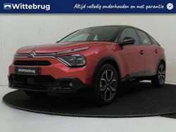 Rood, metallic lak Gebruikt 2023 Citroën e-C4 Feel SUV | € 19.925 (Eerlijke prijs)
