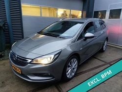 Bruin, metallic lak Gebruikt 2016 Opel Astra Business Stationwagen | € 4.950 (Duur)