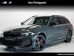 Grijs Gebruikt 2024 BMW 330 M Sport Stationwagen | € 58.995