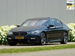 Grijs, metallic lak Gebruikt 2015 BMW 750 Executive Sedan | € 42.940 (Duur)
