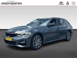 Grijs, metallic lak Gebruikt 2021 BMW 330 Executive Stationwagen | € 31.430 (Goede deal)