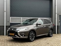 Bruin (metallic) Gebruikt 2015 Mitsubishi Outlander P-HEV Edition SUV | € 10.950 (Goede deal)