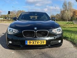 Zwart Gebruikt 2014 BMW 114 Executive Hatchback | € 8.995 (Eerlijke prijs)