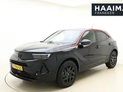Zwart, metallic lak Gebruikt 2024 Opel Mokka-e SUV | € 24.950 (Eerlijke prijs)