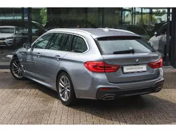 Bluestone (grijs metallic) Gebruikt 2019 BMW 520 Executive Stationwagen | € 32.950 (Duur)