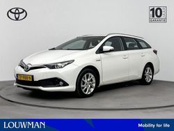 Wit Gebruikt 2018 Toyota Auris Hybrid Stationwagen | € 15.945 (Eerlijke prijs)