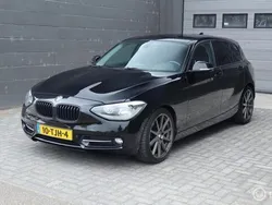 Zwart Gebruikt 2012 BMW 116 Sport Line Hatchback | € 6.995 (Eerlijke prijs)