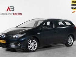 Grijs Gebruikt 2015 Toyota Auris Hybrid Stationwagen | € 12.295 (Eerlijke prijs)