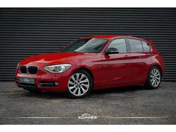 Rood Gebruikt 2012 BMW 118 Sport Line Hatchback | € 5.950 (Eerlijke prijs)