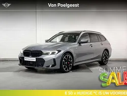 Skyscraper (licht grijs) Gebruikt 2024 BMW 330e M Sport Stationwagen | € 62.900