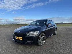 Zwart Gebruikt 2013 BMW 135 Hatchback | € 18.000