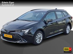 Zwart Gebruikt 2023 Toyota Corolla Hybrid Active Stationwagen | € 25.845 (Eerlijke prijs)