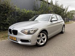 Grijs Gebruikt 2013 BMW 114 Sport Line Hatchback | € 6.450 (Eerlijke prijs)