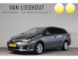 Grijs (metallic) Gebruikt 2016 Toyota Auris Hybrid Trend Hatchback | € 12.650 (Eerlijke prijs)